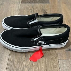 Brand NWT Vans Classic Slip Ons in black canvas